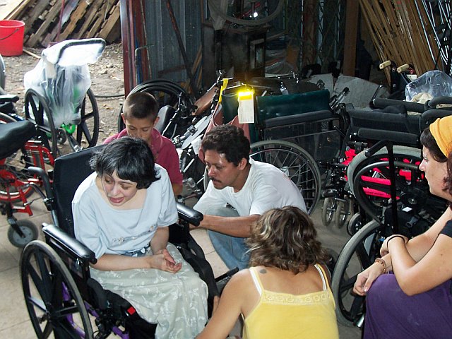 A trained staff of wheelchair repair persons, with the requisite skills and expertise to repair and refurbish wheelchairs.